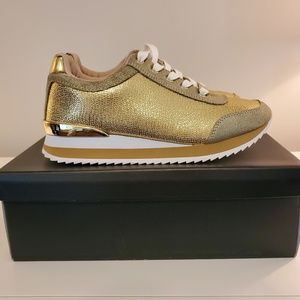Bebe gold sneakers